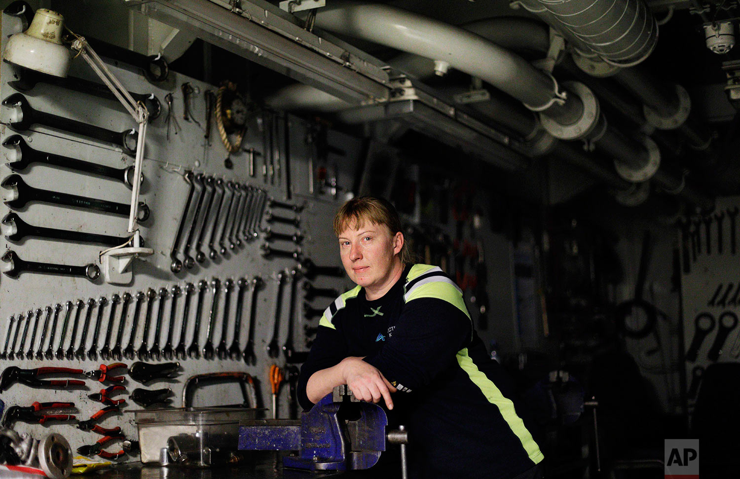  Electrician Kaija Peuhkuri, 42, stands for a portrait in the machine shop of the Finnish icebreaker MSV Nordica as the ship sails north in the Bering Sea toward the Arctic, Wednesday, July 12, 2017. Peuhkuri started as a cook on ships over 20 years 