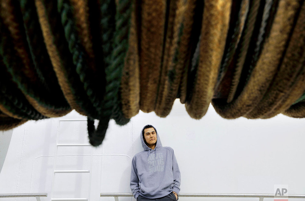  Trainee David Kullualik, 24, of Iqaluit, Nunavut, in Canada's northern territories, stands for a portrait on a deck aboard the Finnish icebreaker MSV Nordica as the ship sails north in the Bering Sea toward the Arctic, Wednesday, July 12, 2017. Kull