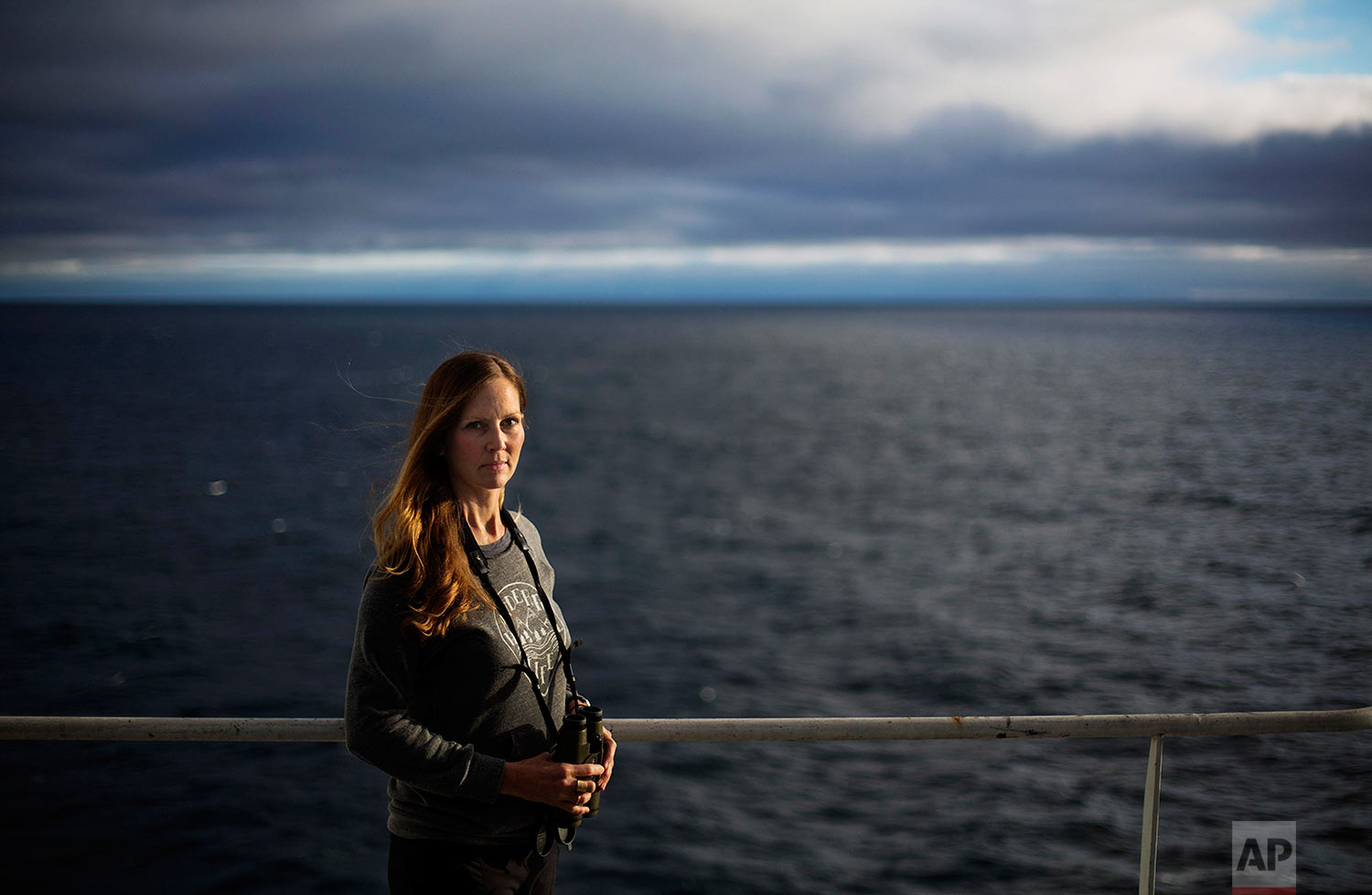  Field biologist Paula von Weller, 45, of Portland, Ore., stands for a portrait aboard the Finnish icebreaker MSV Nordica as it sails in the North Pacific Ocean toward the Bering Strait, Tuesday, July 11, 2017. "Few people in the world get to sail th