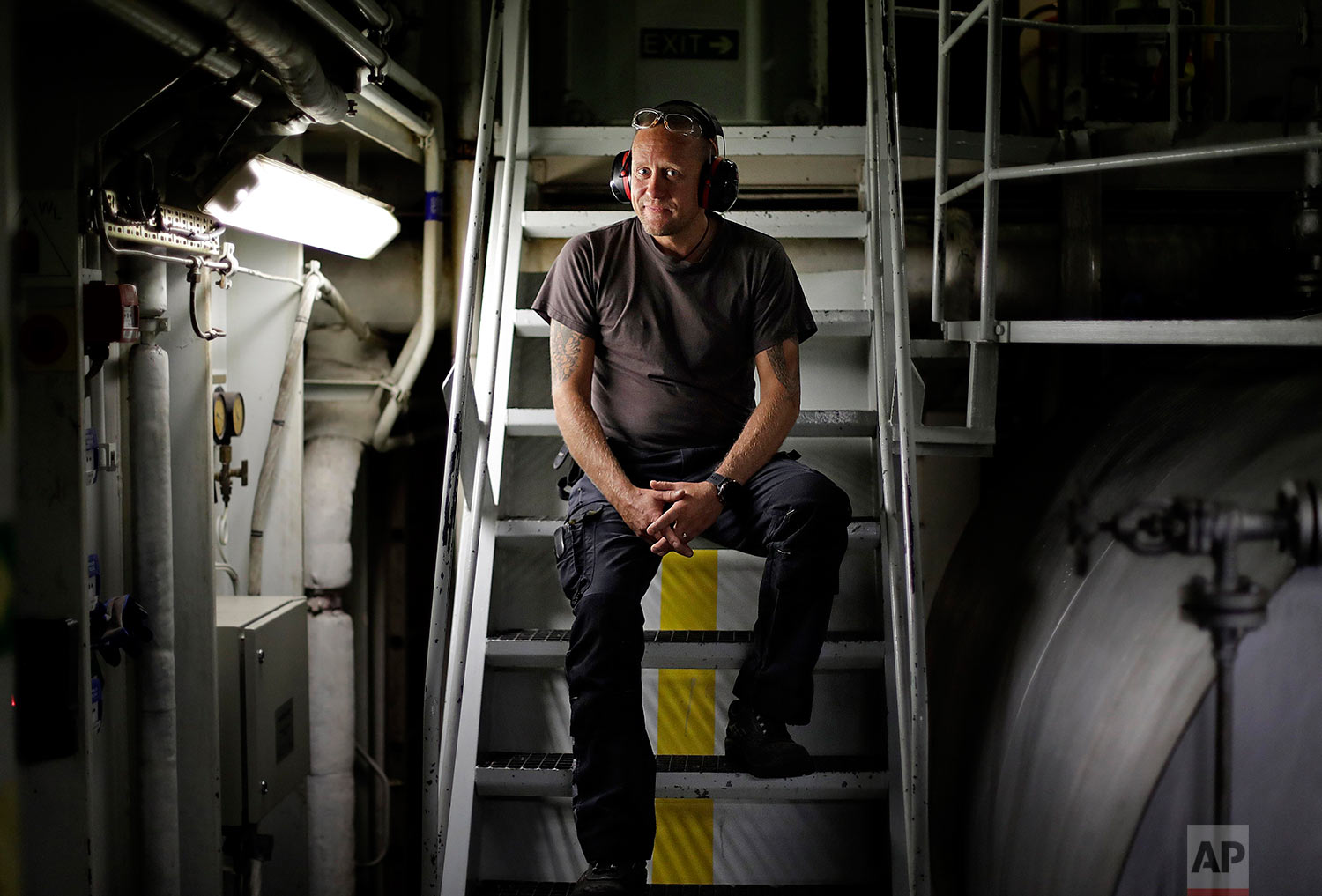  First engineer Kristian Autio, 44, sits for a portrait in the engine room of the Finnish icebreaker MSV Nordica as it sails in the North Pacific Ocean toward the Bering Strait, Sunday, July 9, 2017. Autio has worked aboard Finnish icebreakers since 