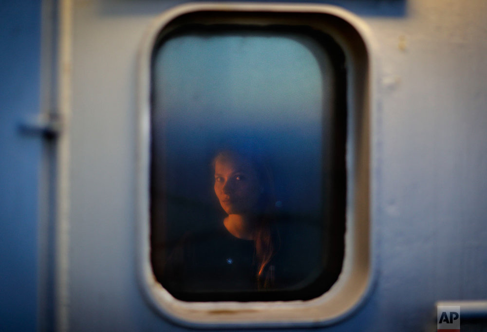  Researcher Daria Gritsenko, 30, of the University of Helsinki, sits for a portrait in her cabin aboard the Finnish icebreaker MSV Nordica as the ship sails north in the Bering Sea toward the Arctic, Thursday, July 13, 2017. She is hoping to learn mo