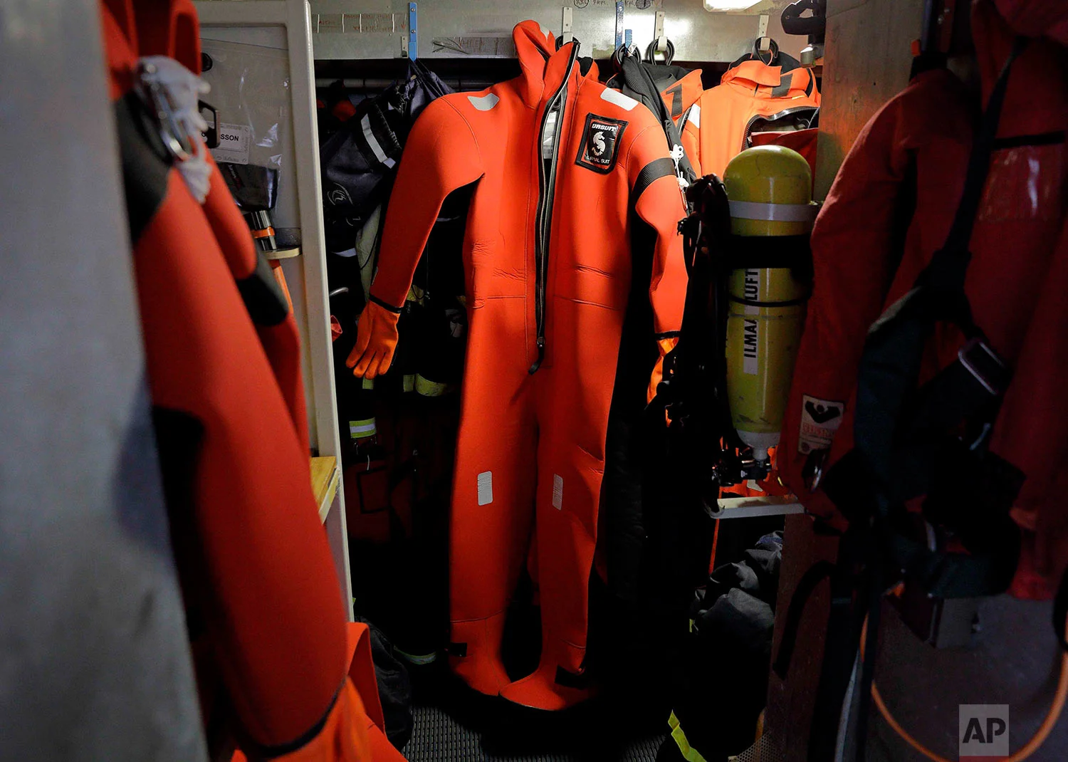 A survival suit is displayed aboard the Finnish icebreaker MSV Nordica as it sails through Lancaster Sound while traversing the Northwest Passage through the Canadian Arctic Archipelago, Monday, July 24, 2017. (AP Photo/David Goldman) 