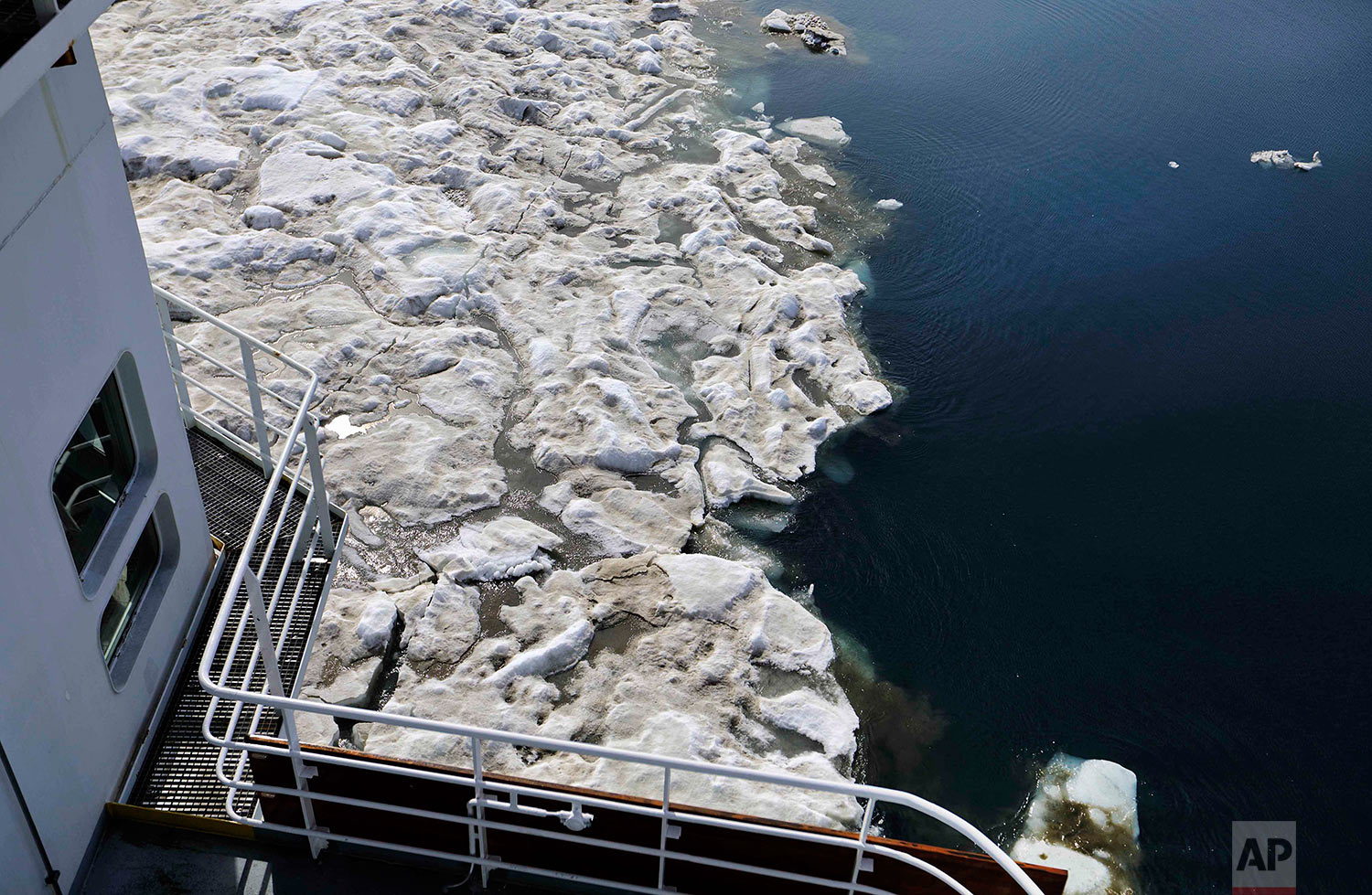 The Finnish icebreaker MSV Nordica sails through sea ice floating on the Beaufort Sea off the coast of Alaska while traversing the Arctic's Northwest Passage, Sunday, July 16, 2017. Because of global warming, more sea ice is being lost each summer than is being replenished in winters. Although sea ice is likely to continue forming each winter it may be restricted to even higher latitudes. Less sea ice coverage also means that less sunlight will be reflected off the surface of the ocean in a process known as the albedo effect. The oceans will absorb more heat, further fueling global warming. (AP Photo/David Goldman) 