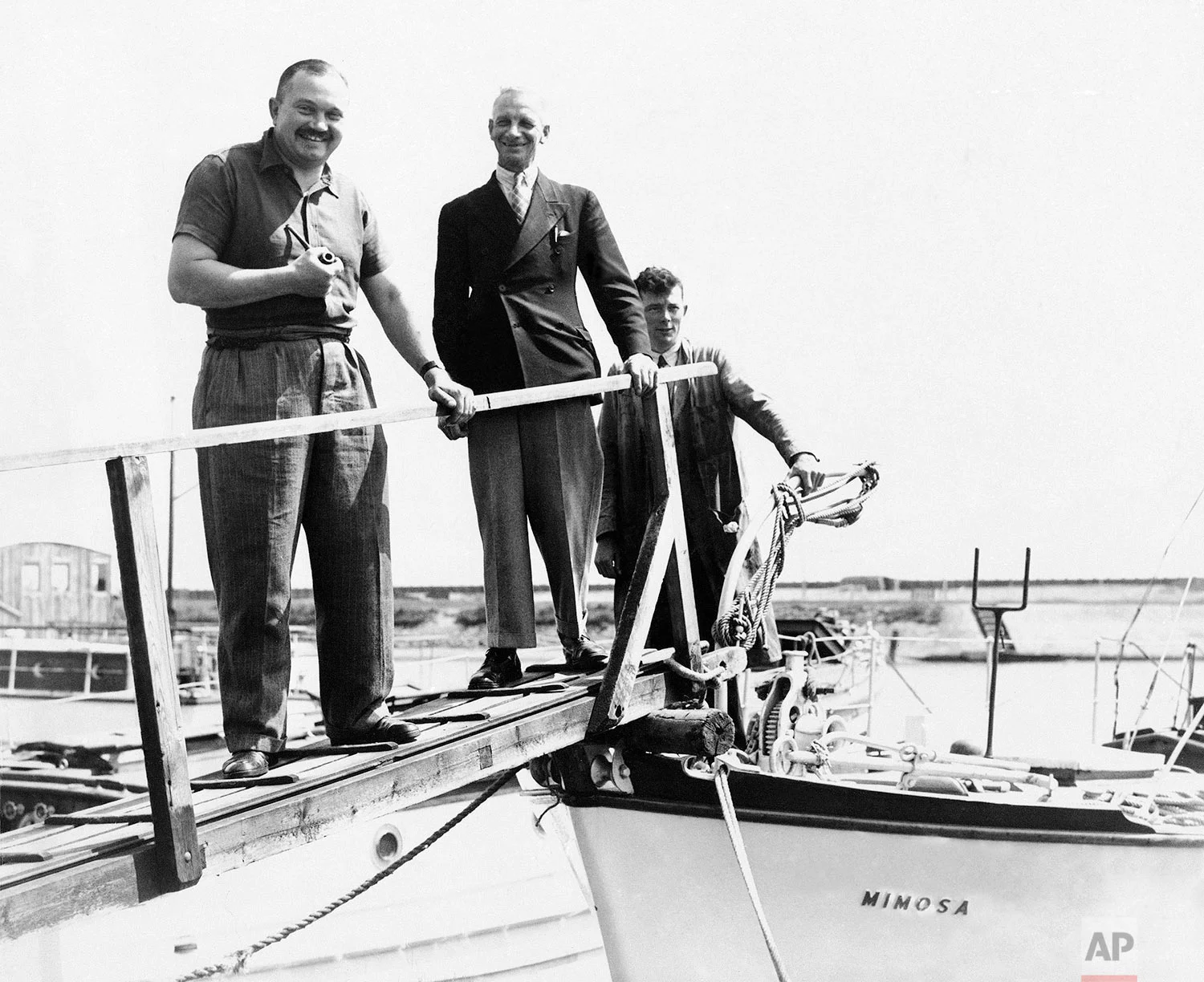 "The Salvation Navy" fisherman, longshoreman, full-time and part-time seafaring folk and yachtsmen all did their bit in the transference of B.E.F. and French troops from Dunkirk to England. Many thrilling tales will eventually be told of "The Salvation Navy" shown June 24, 1940, with a scratch crew captained the cabin cruiser "Mimosa" from Shoreham Harbor to Dunkirk to assist in the work. He is seen coming ashore followed by Mr. Clark, who organized left Shoreham to assist in the work. (AP Photo)