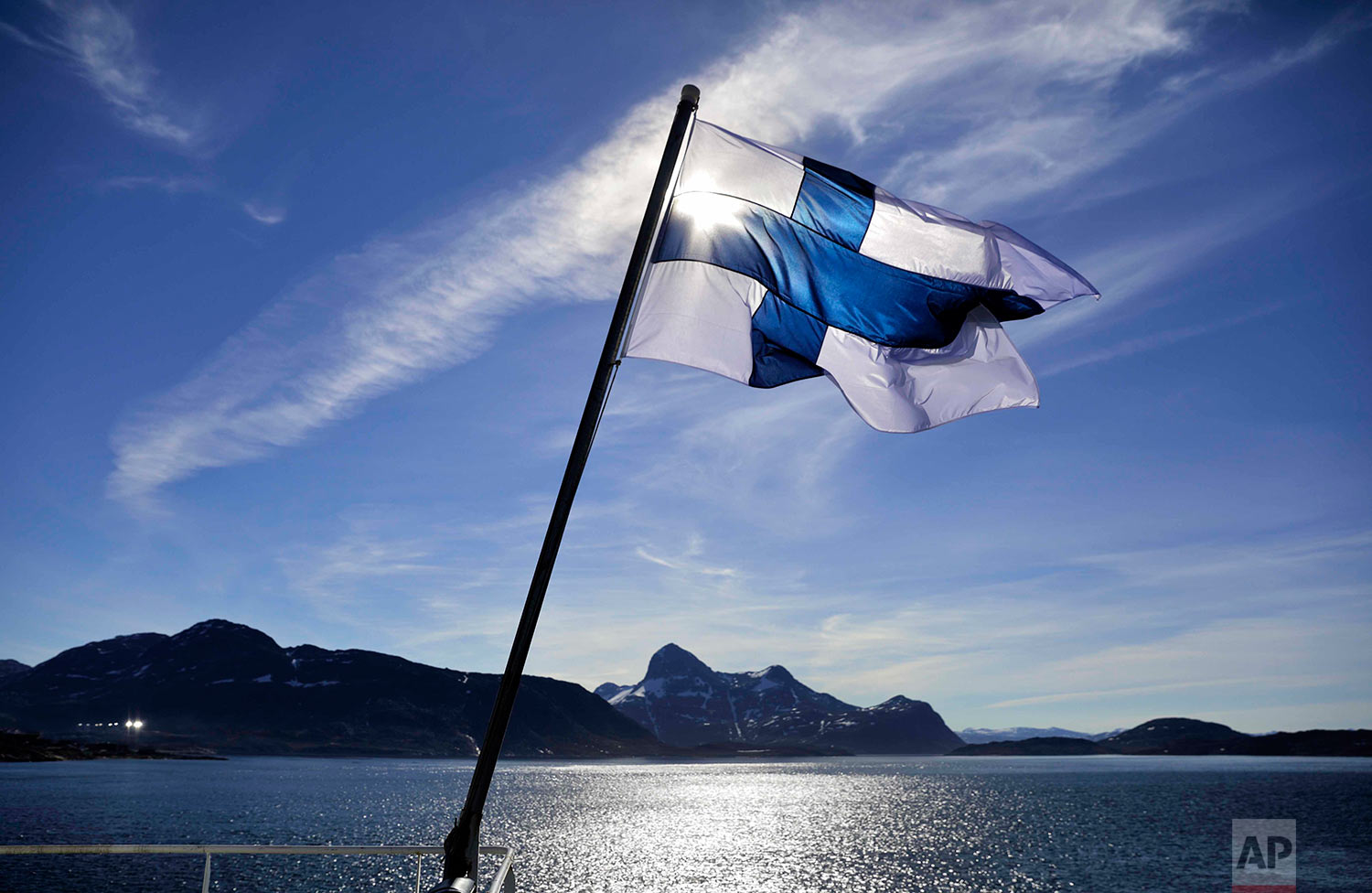  The flag of Finland flies aboard the Finnish icebreaker MSV Nordica as it arrives into Nuuk, Greenland, after traversing the Northwest Passage through the Canadian Arctic Archipelago, Saturday, July 29, 2017. After 24 days at sea and a journey spann