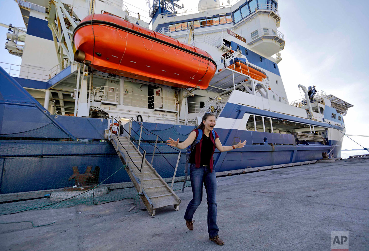 Researcher Daria Gritsenko steps onto land for the first time since setting sail aboard the Finnish icebreaker MSV Nordica as it arrives into Nuuk, Greenland, after traversing the Northwest Passage through the Canadian Arctic Archipelago, Saturday, 