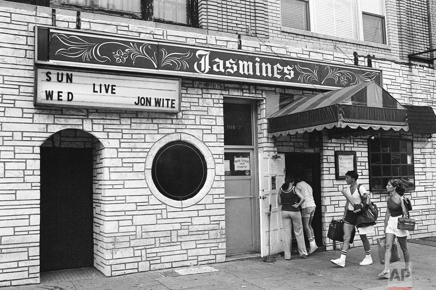Exterior of Jasmine’s discoteque at 7112 3rd Ave., in Brooklyn, July 31, 1977. (AP Photo/Ira Schwartz)