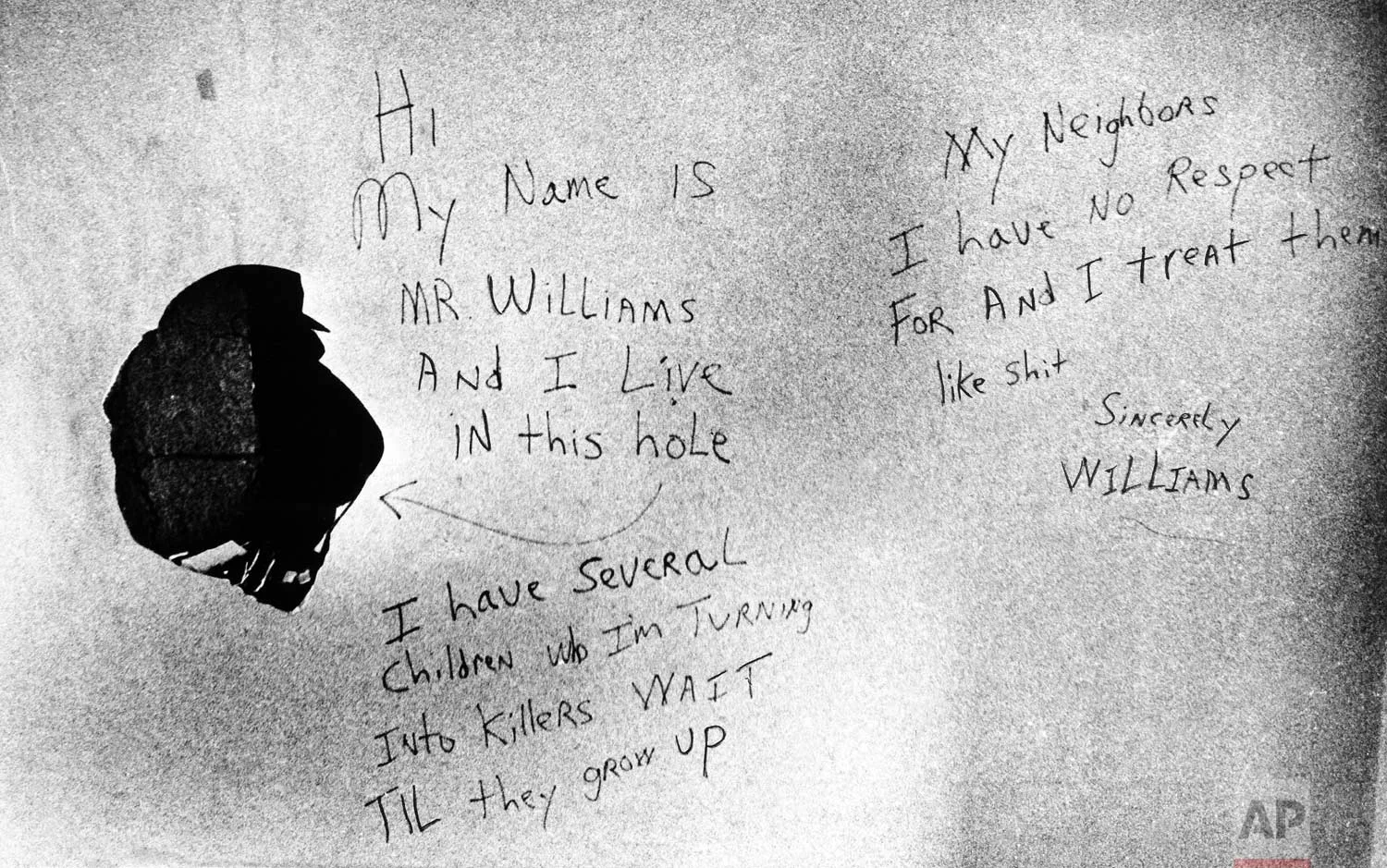 These handwritten messages were found on the wall in the apartment of .44-caliber “Son of Sam” shooting suspect David Berkowitz in Yonkers, New York, Thursday, Aug. 12, 1977. The suspect is undergoing psychiatric questioning on Friday to determine if he is fit to stand trial. (AP Photo)