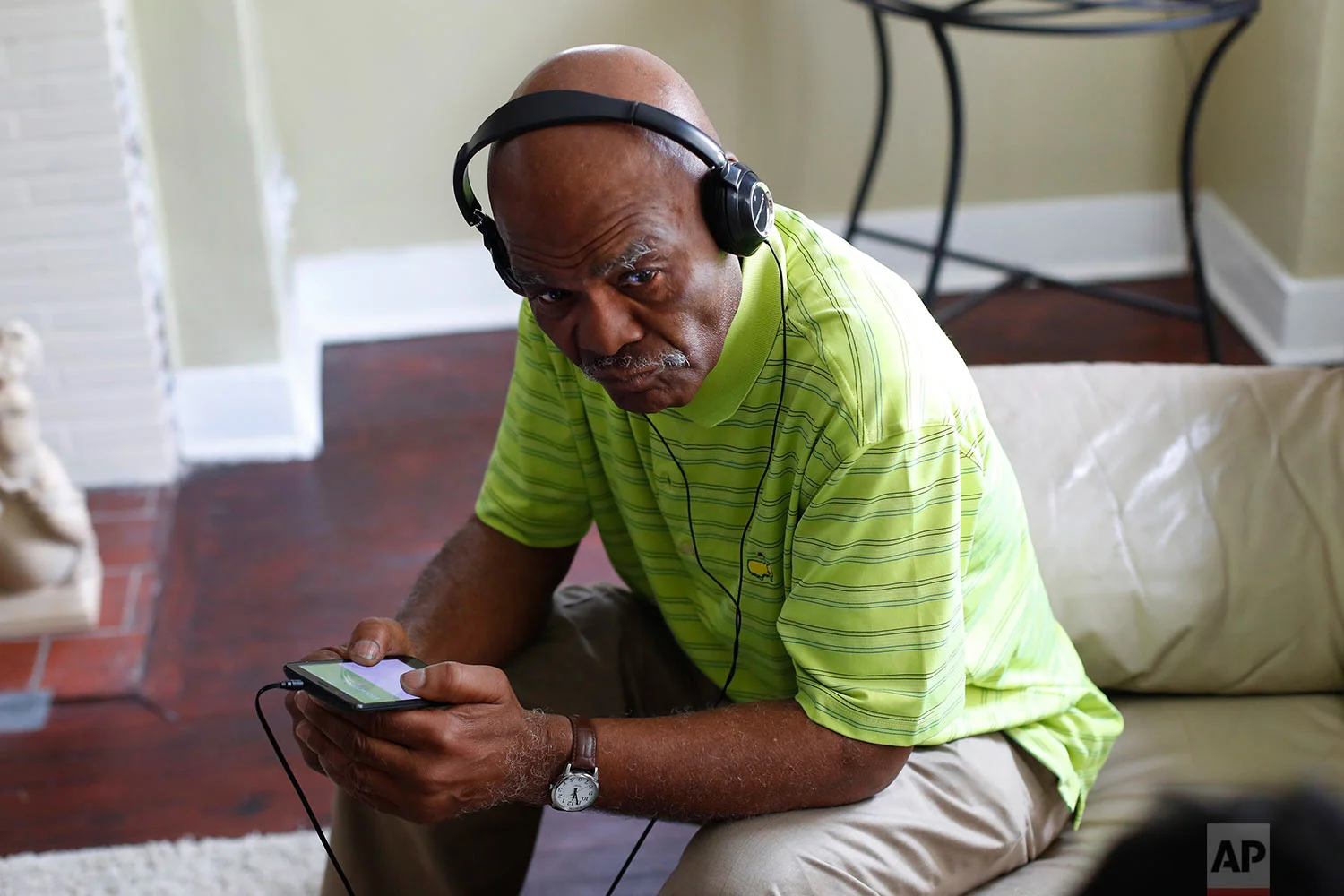 John Hall talks on his phone in Detroit, Friday, May 19, 2017. (AP Photo/Paul Sancya)