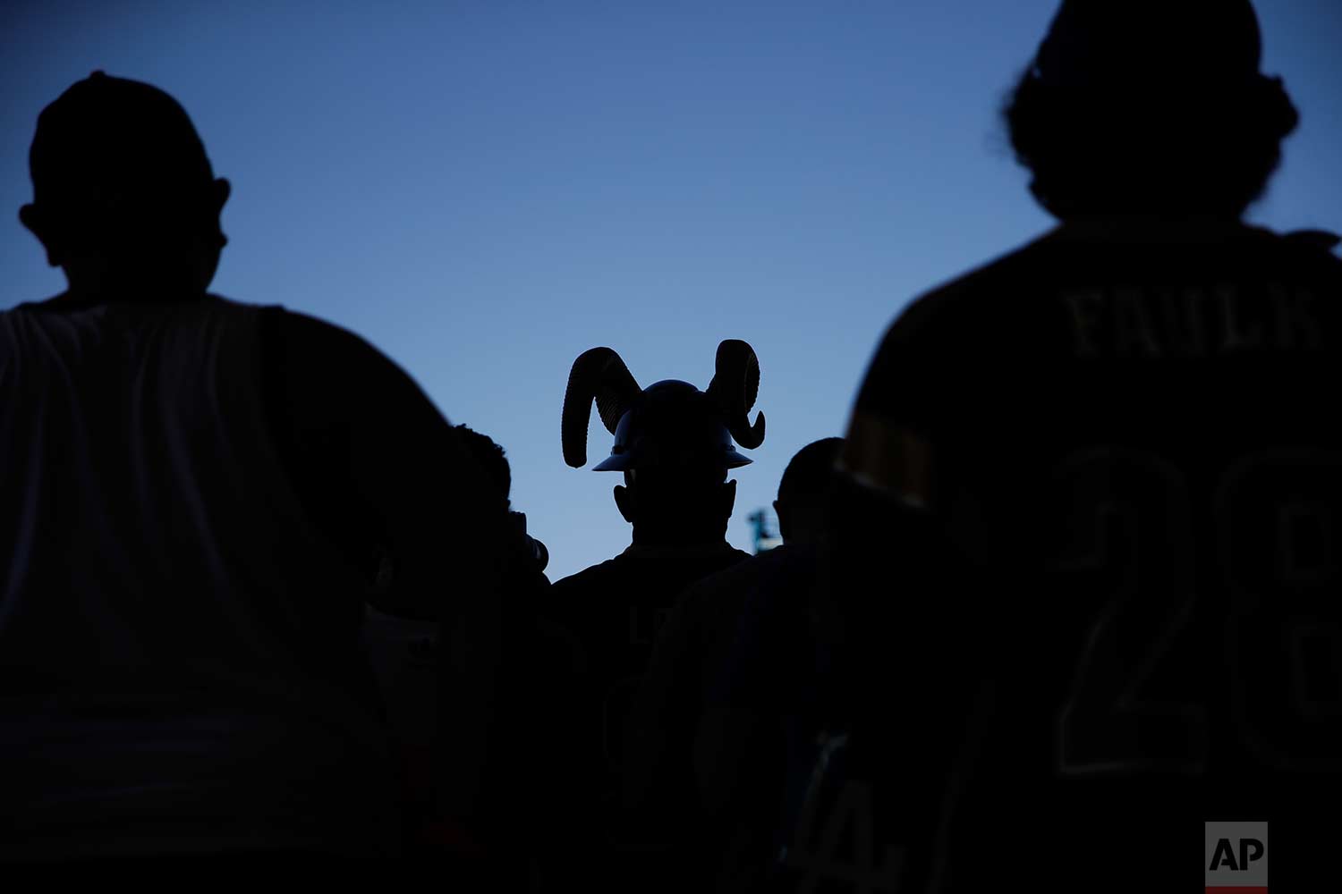  Fans watch the Los Angeles Rams practice at NFL football training camp in Irvine, Calif., on Saturday, July 29, 2017. (AP Photo/Jae C. Hong) 
