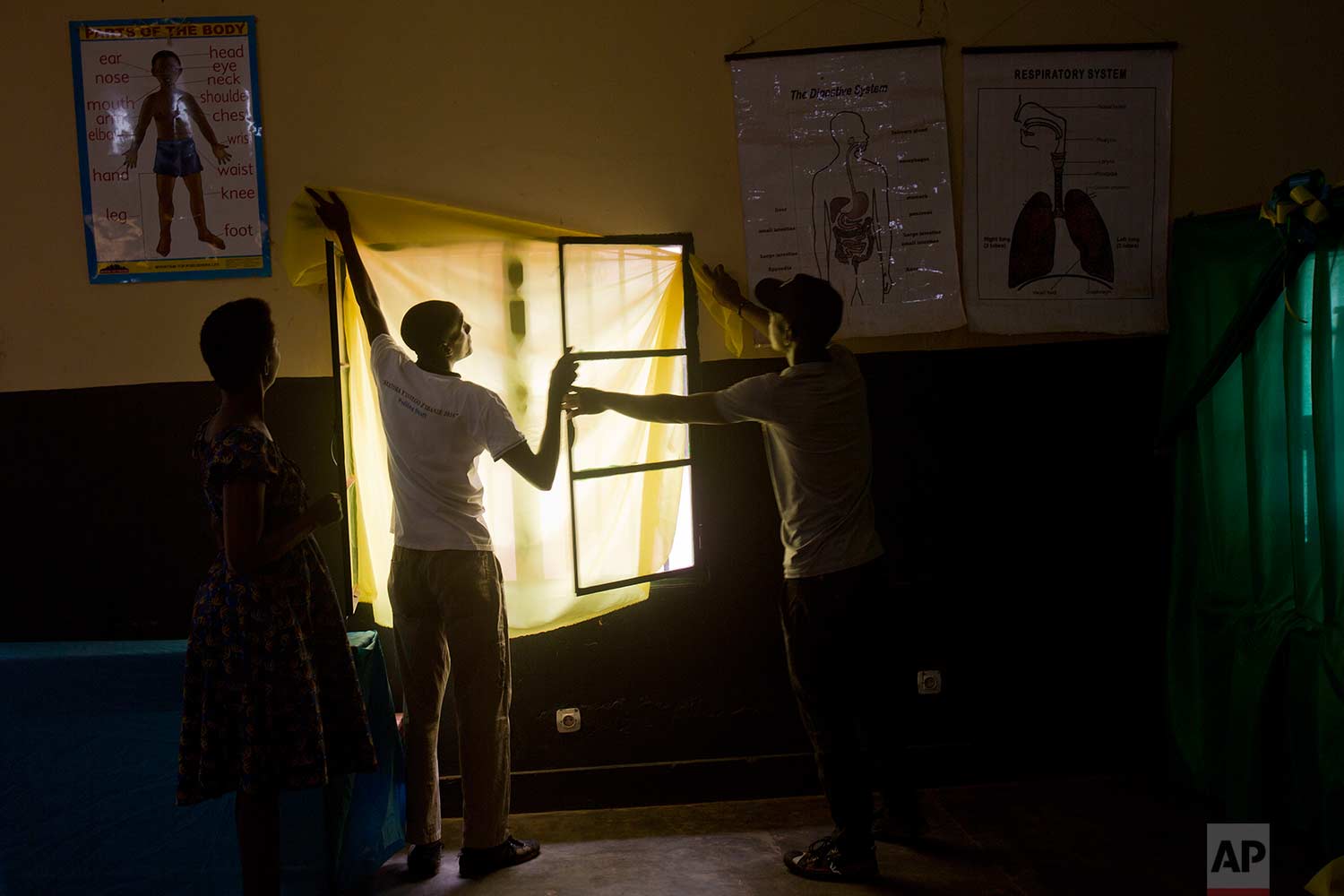  Election volunteers prepare a polling station in Rwanda's capital Kigali, Thursday Aug. 3, 2017, in preparation for Friday's presidential elections. (AP Photo/Jerome Delay) 