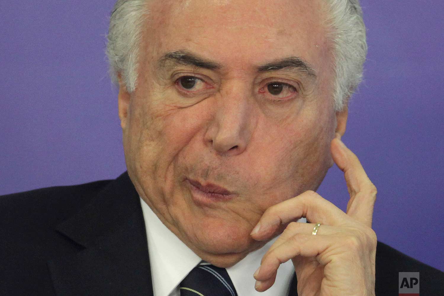 In this July 6, 2017 photo, Brazil's President Michel Temer attends a ceremony at the Planalto Presidential Palace, in Brasilia, Brazil. (AP Photo/Eraldo Peres)