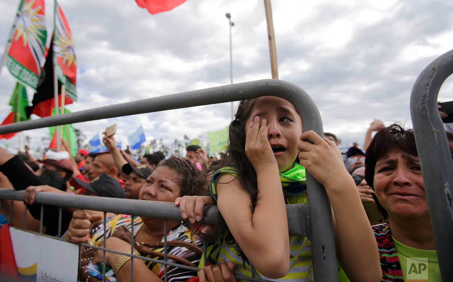 Supporters get emotional as the say farewell to Ecuador's former president Rafael Correa, before he departs for Belgium, in Quito, Ecuador, Monday, July 10, 2017. (AP Photo/Dolores Ochoa)
