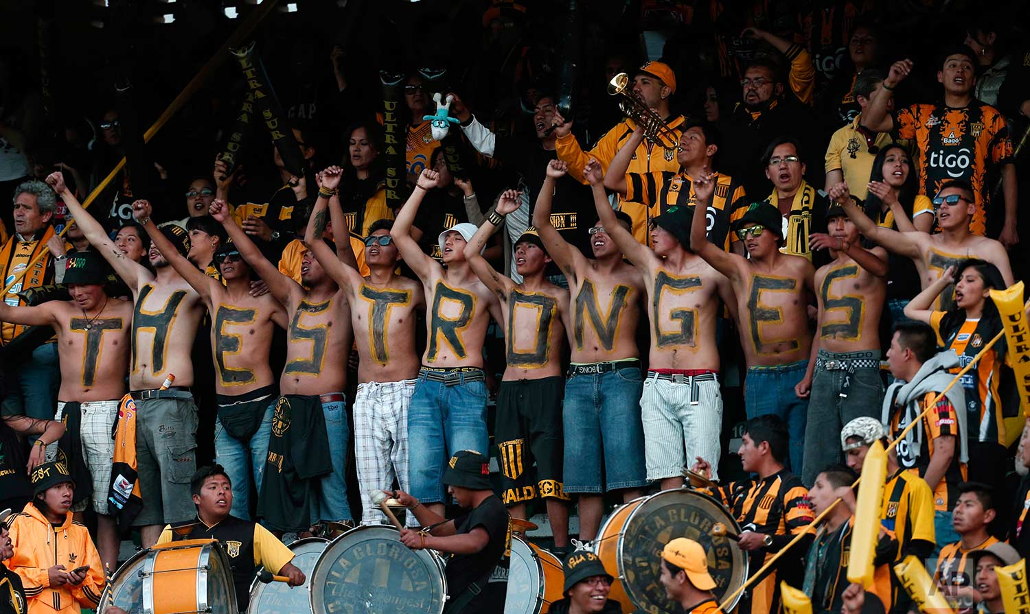 Fans of Bolivia's The Strongest cheer for their team before a Copa Libertadores soccer match against Argentina's Lanus in La Paz, Bolivia, Thursday, July 6, 2017. (AP Photo/Juan Karita)