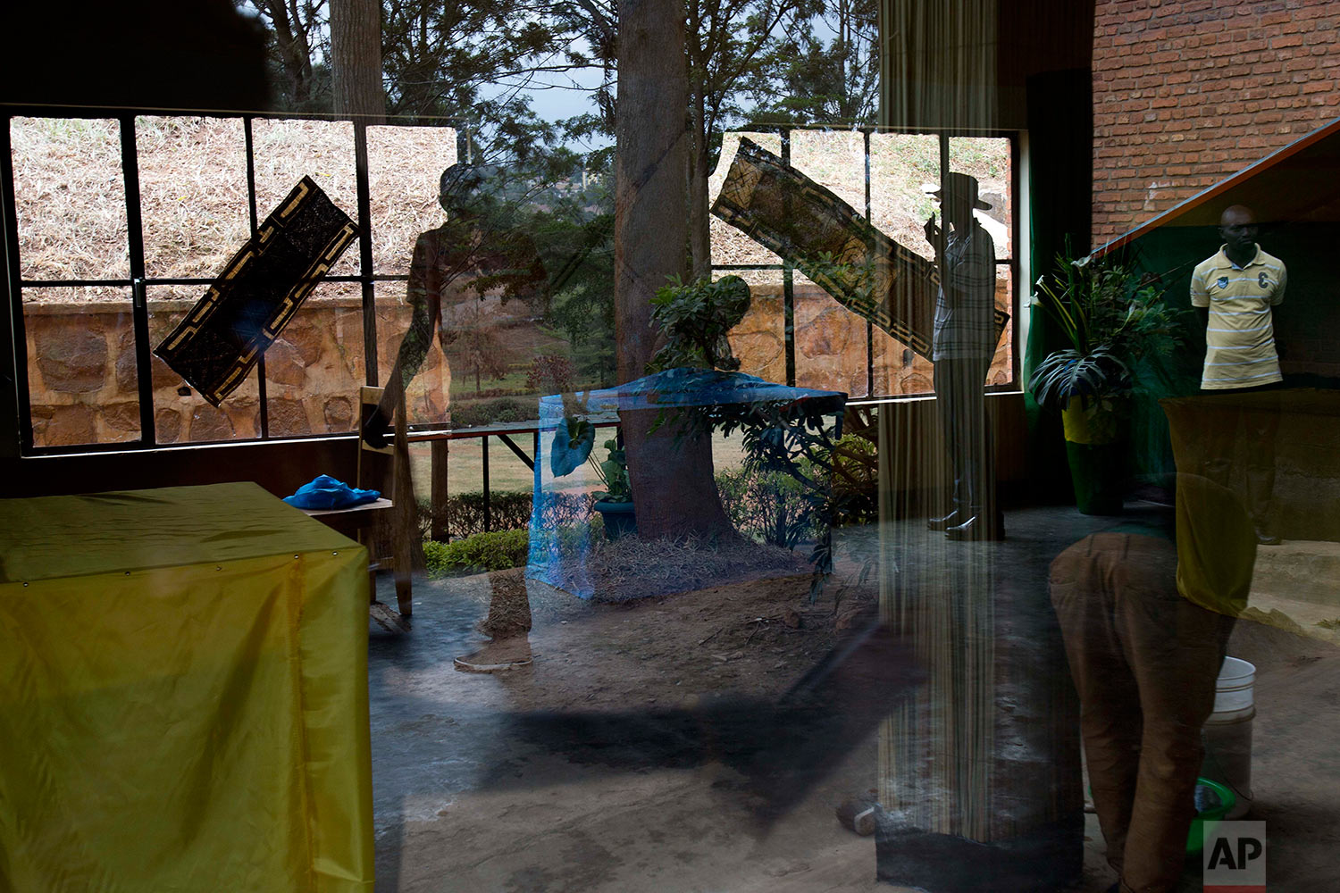  Election volunteers decorate a polling station in Rwanda's capital Kigali, Thursday Aug. 3, 2017, in preparation for the presidential election on Friday in which outgoing president Paul Kagame is widely expected to win another term after the governm
