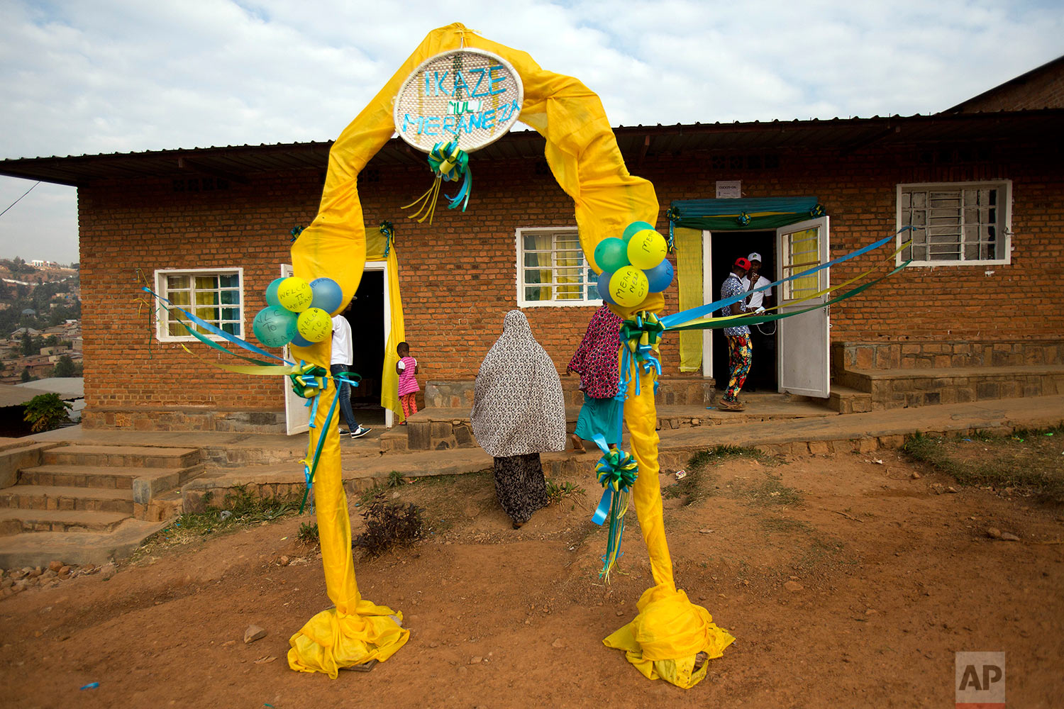  Voters line up to cast their vote at a polling station for the presidential election, Friday Aug. 4, 2017, in the capital Kigali, Rawanda. Incumbent President Paul Kagame is widely expected to win another term after the government disqualified three