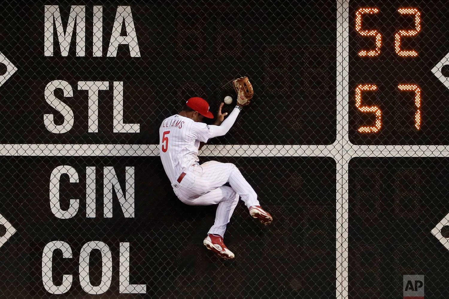  Philadelphia Phillies left fielder Nick Williams cannot catch an RBI triple by Pittsburgh Pirates' Josh Bell during the fourth inning of a baseball game, Wednesday, July 5, 2017, in Philadelphia. (AP Photo/Matt Slocum) 