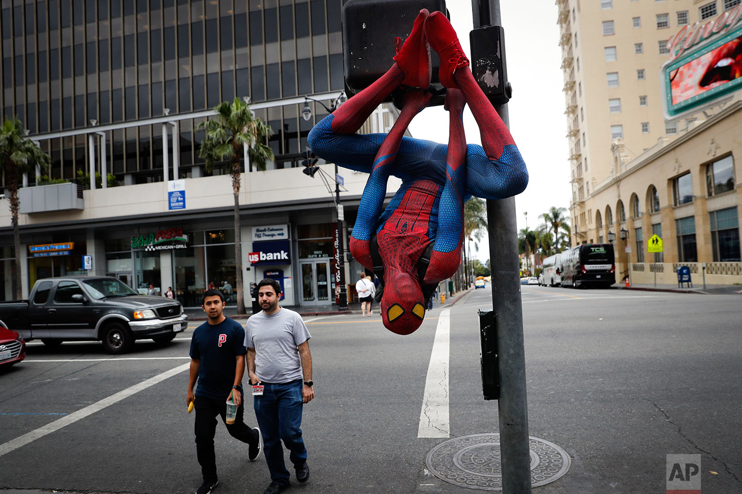 Struggling actors moonlight as superheroes in LA — AP Photos