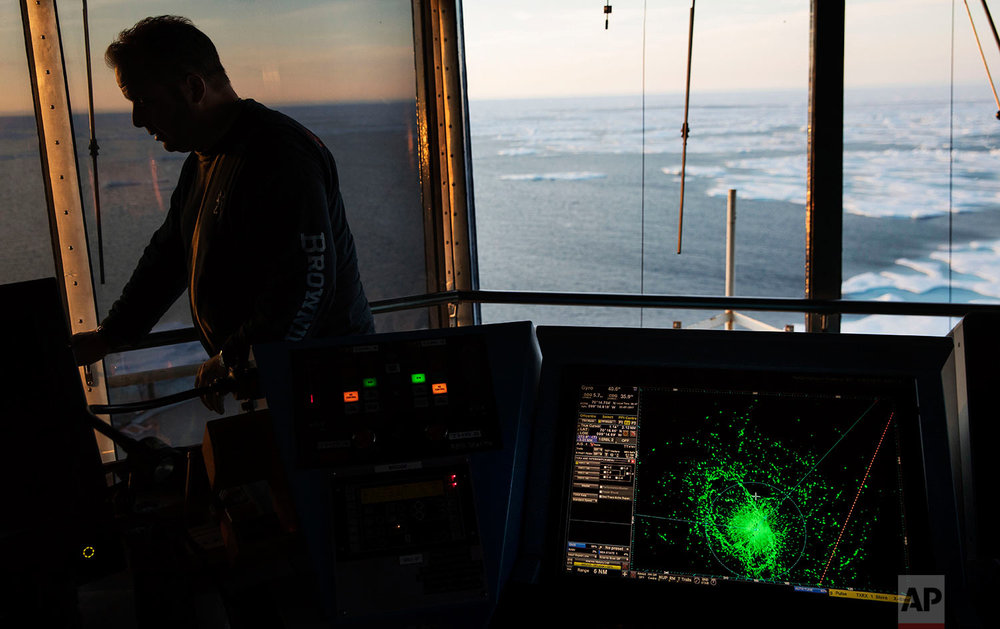  A radar screen shows sea ice ahead of the Finnish icebreaker MSV Nordica during transit through the Northwest Passage in the Canadian Arctic Archipelago as first officer Jukka Vuosalmi stands on the bridge, Friday, July 21, 2017. Once the ship enter