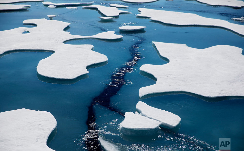  Sea ice breaks apart as the Finnish icebreaker MSV Nordica traverses the Northwest Passage through the Victoria Strait in the Canadian Arctic Archipelago Friday, July 21, 2017. Since the first orbital images were taken in 1979, Arctic sea ice covera