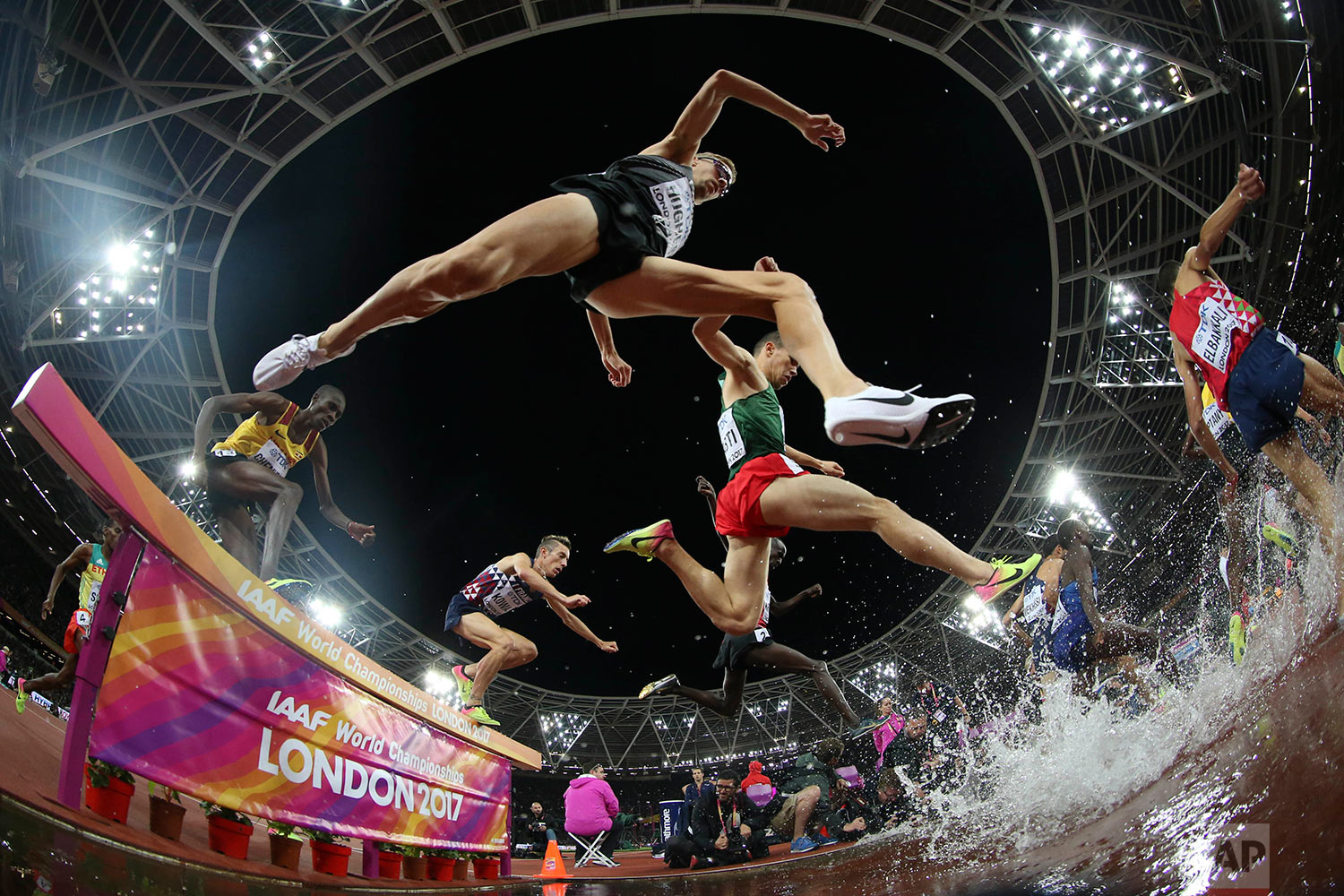  Athletes compete in the men's 3000-meter steeplechase final during the World Athletics Championships in London Tuesday, Aug. 8, 2017. (AP Photo/Matthias Schrader) 
