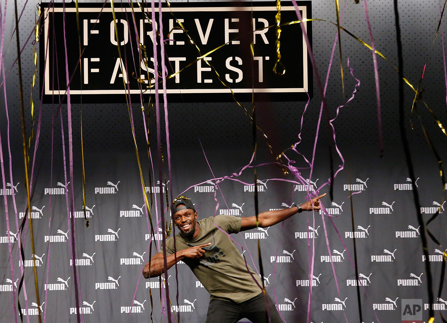  Jamaican athlete Usain Bolt celebrates after a press conference ahead of the World Athletics championships in London, Tuesday, Aug. 1, 2017. Sprint legend Bolt, a multiple Olympic and World Championship gold medallist, is set to retire after the Wor
