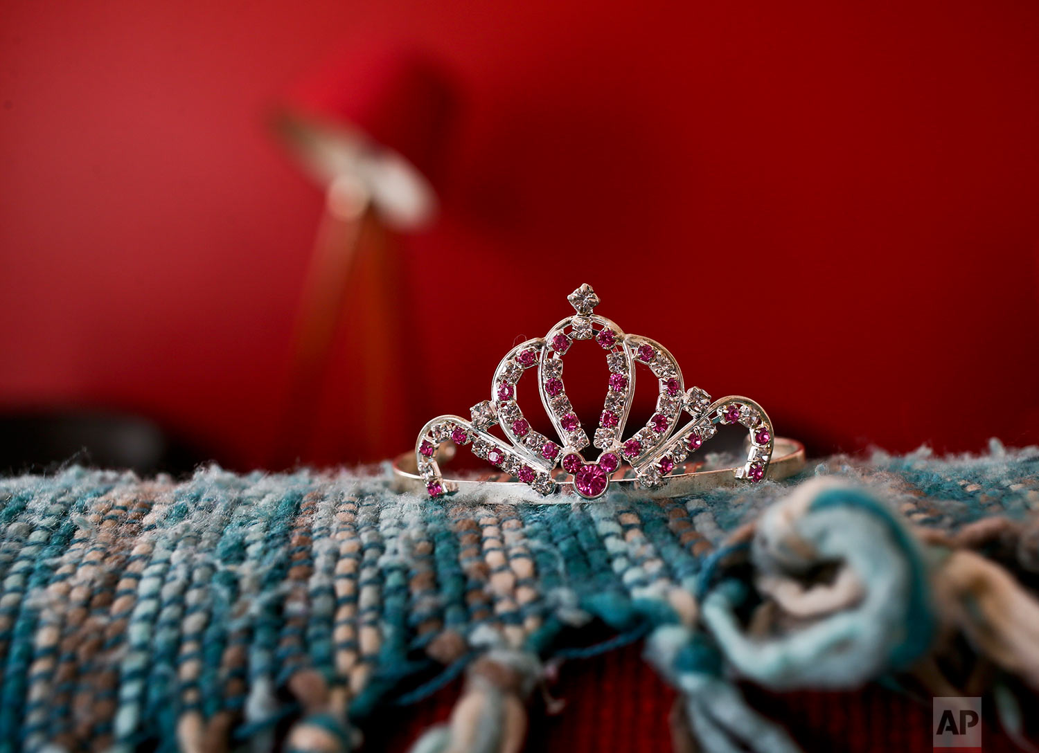  In this July 18, 2017 photo, a rhinestoned crown sits on a sofa in Luna's home in Santiago, Chile. Soon after Luna learned how to talk, she asked her mother why she had named her like a boy, if she wanted to be a girl. A judge ruled in favor of lega