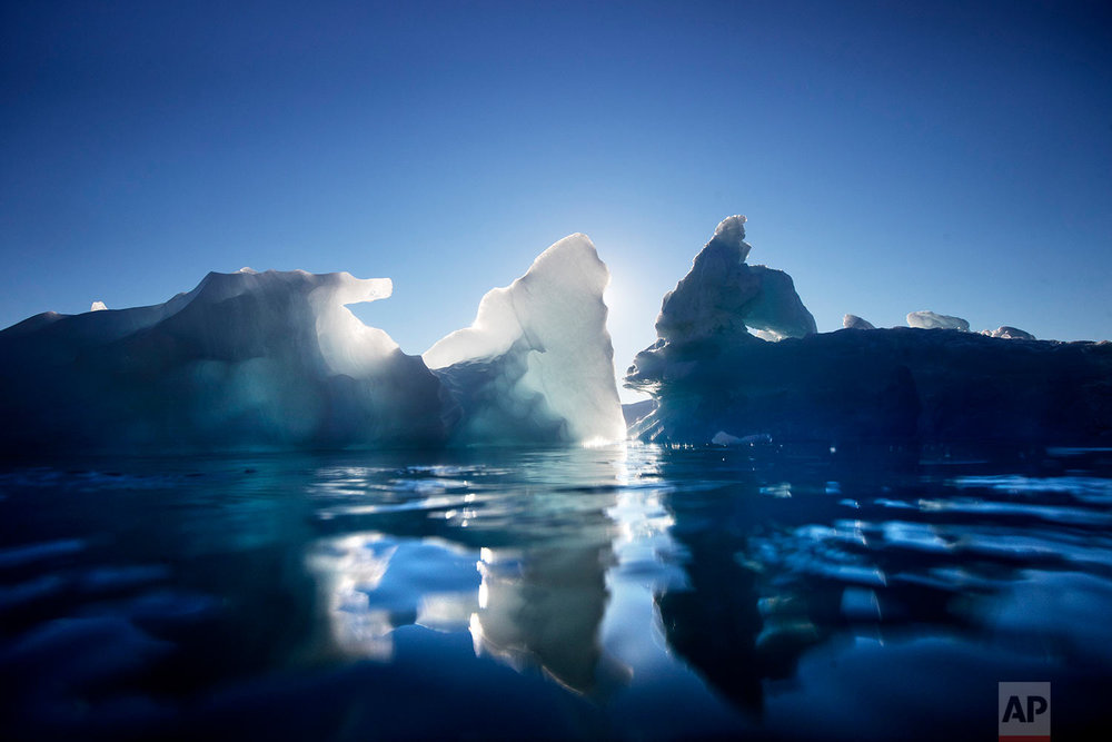  Icebergs float in the Nuup Kangerlua Fjord near Nuuk in southwestern Greenland, Tuesday Aug. 1, 2017. (AP Photo/David Goldman) 