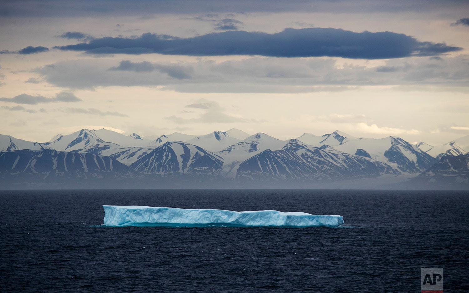  An iceberg floats past Bylot Island in the Canadian Arctic Archipelago, Monday, July 24, 2017. &nbsp;(AP Photo/David Goldman) 