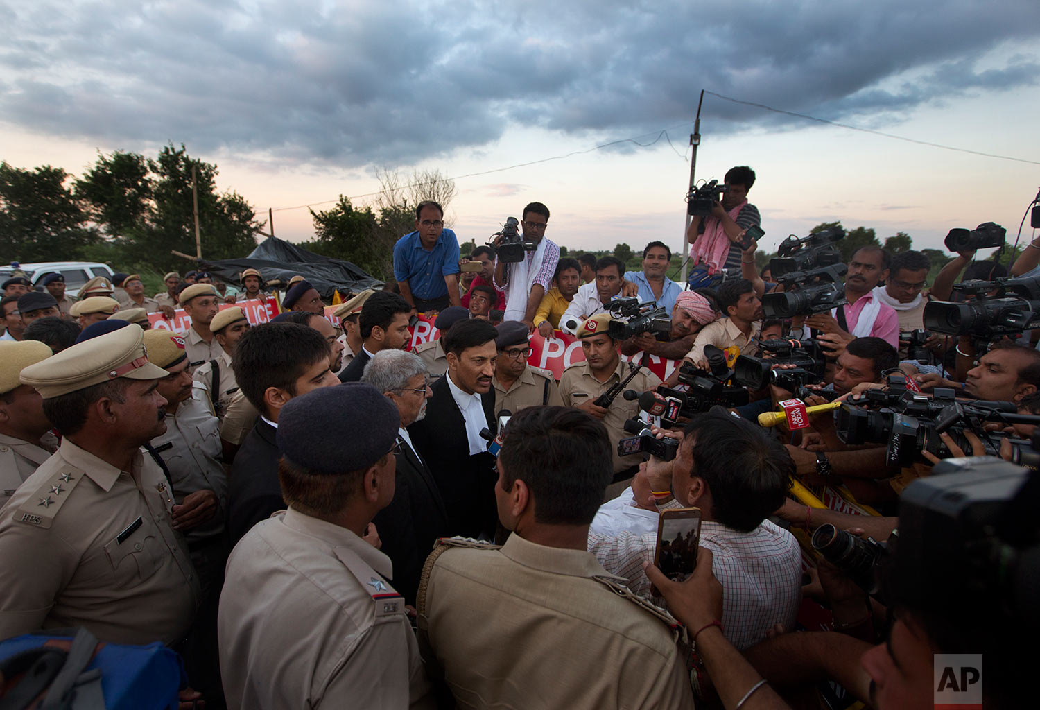  Advocate S.K. Garg Narwana, center, lawyer of Indian guru, who calls himself Dr. Saint Gurmeet Singh Ram Rahim Insan, talks to the media after a court hearing in Sunaria Jail, in Rohtak, some 80 kilometers (50 miles) from New Delhi, India, Monday, A