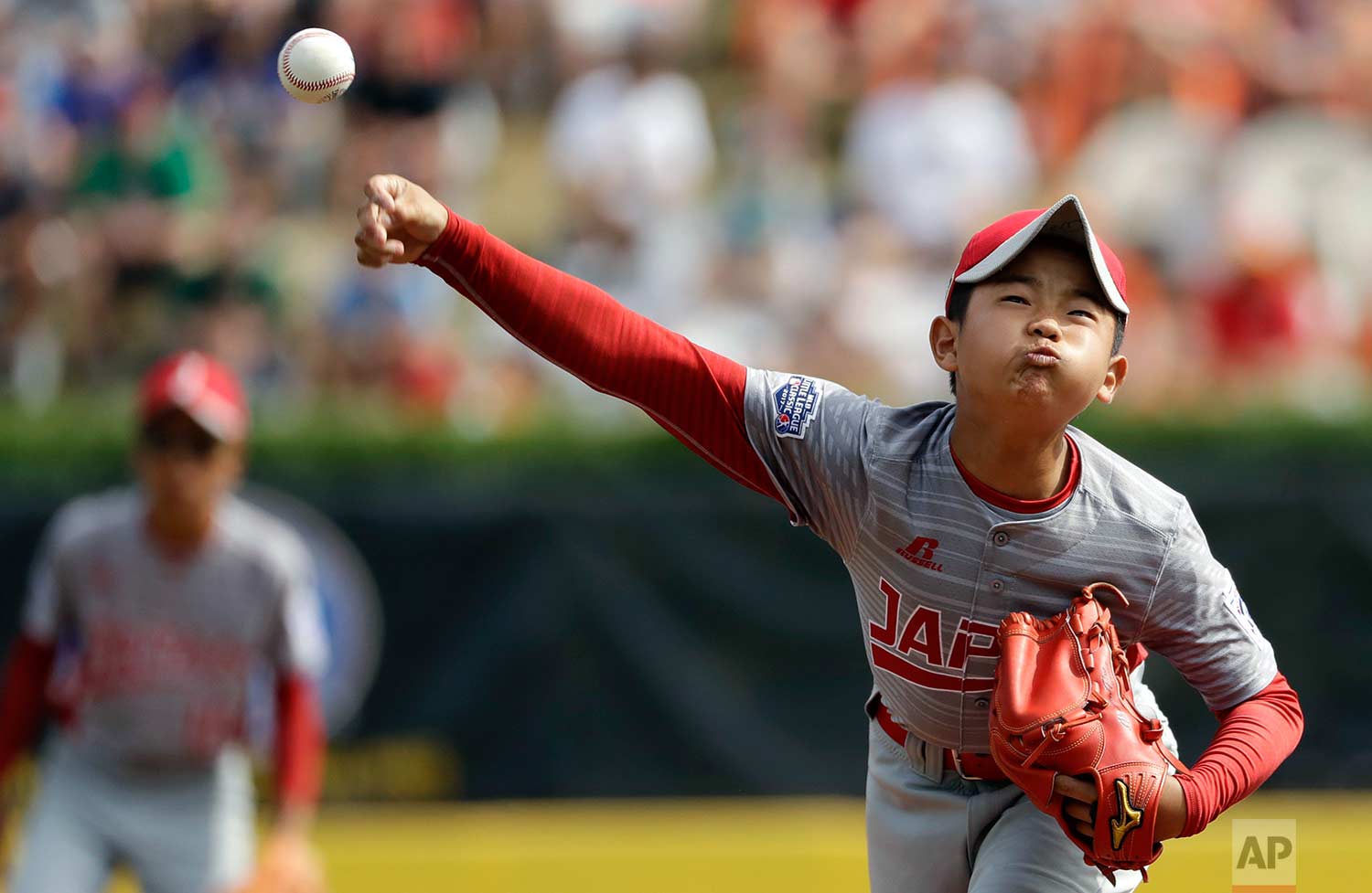  Japan's Tsubasa Tomii pitches during the first inning of Little League World Series Championship baseball game against Lufkin, Texas, Sunday, Aug. 27, 2017, in South Williamsport, Pa. (AP Photo/Matt Slocum) 