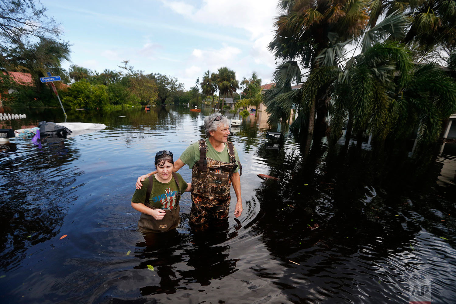  Kelly McClenthen returns to see the flood damage to her home with her boyfriend Daniel Harrison in the aftermath of Hurricane Irma in Bonita Springs, Fla., Monday, Sept. 11, 2017. (AP Photo/Gerald Herbert) 