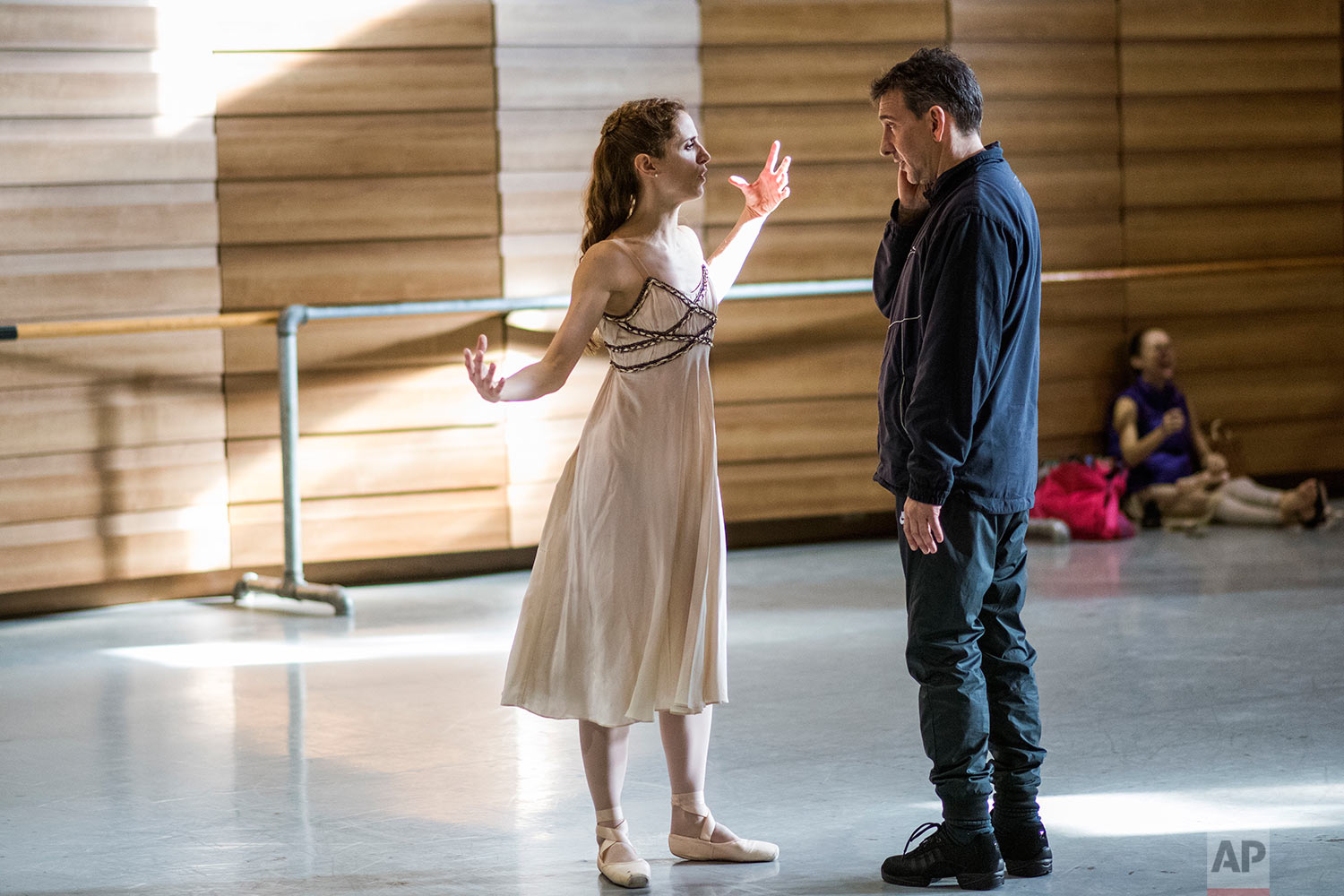  In this Tuesday, Sept. 12, 2017 photo, Director Julio Bocca instructs principal ballet dancer Maria Noel Riccetto during rehearsal for Romeo and Juliet in Montevideo, Uruguay. (AP Photo/Matilde Campodonico) 
