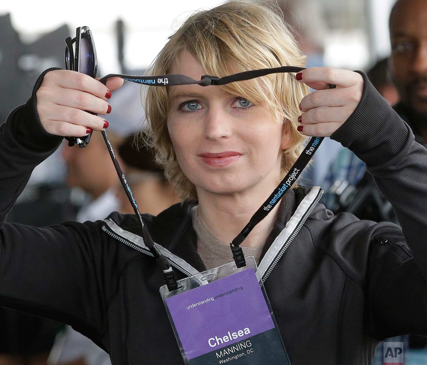  Chelsea Manning puts on a name tag before an appearance at a forum Sunday, Sept. 17, 2017, in Nantucket, Mass. The appearance at the forum is part of The Nantucket Project's annual gathering on the island of Nantucket. Manning is a former U.S. Army 