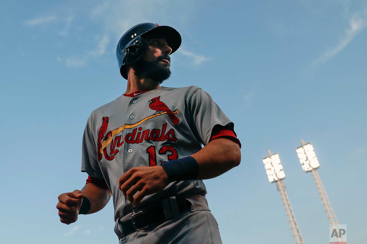  St. Louis Cardinals' Matt Carpenter runs towards the dugout after hitting a solo home run off Cincinnati Reds starting pitcher Rookie Davis in the first inning of a baseball game, Wednesday, Sept. 20, 2017, in Cincinnati. (AP Photo/John Minchillo) 