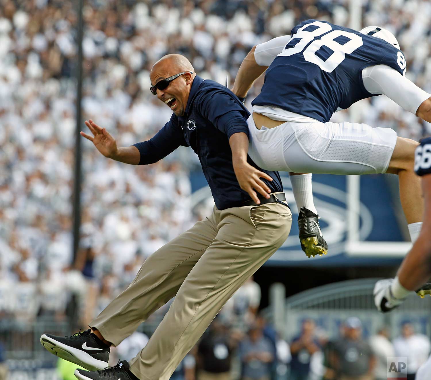  Penn State head coach James Franklin, left, celebrates with tight end Mike Gesicki (88) after Gesicki scored a touchdown against Pittsburgh during the first half of an NCAA college football game in State College, Pa., Saturday, Sept. 9, 2017. (AP Ph