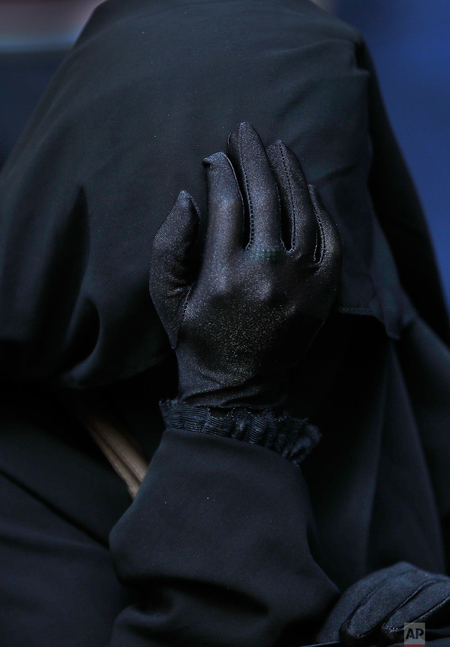  A veiled Lebanese woman supporter of a hardline Sunni cleric Ahmad al-Assir and 33 other militants who are standing trial, reacts during a protest outside the military tribunal, in Beirut, Lebanon,Thursday, Sept. 28, 2017. A military judge is schedu