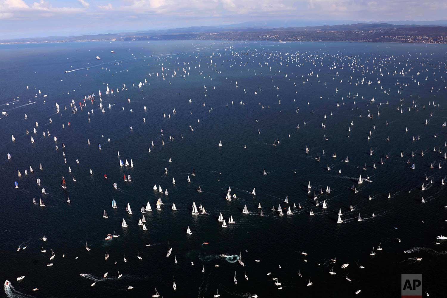  Sailboats participate in the 49nd edition of the traditional "Barcolana" regatta in the Gulf of Trieste, northeastern Italy, Sunday, Oct. 8, 2017. (AP Photo/Paolo Giovannini) 