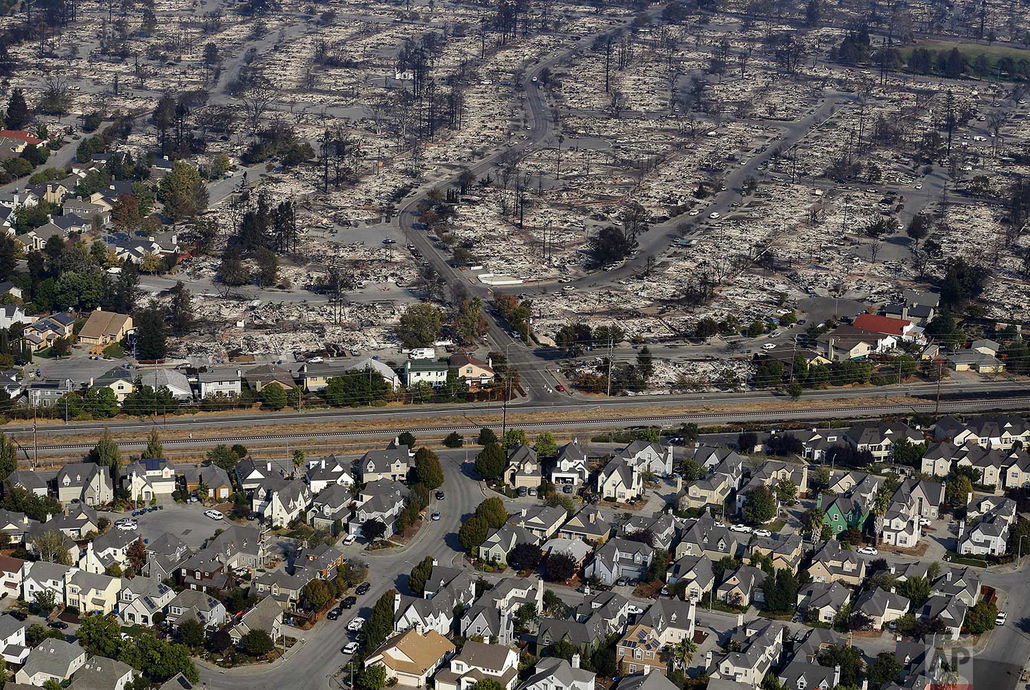 Homes destroyed by fire are seen in an aerial view in Santa Rosa, Calif., o...