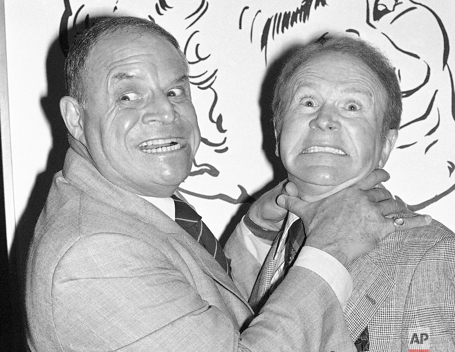  In this Nov. 10, 1977 photo, taken by Associated Press photographer Lennox McLendon shows comedians Don Rickles, left, pretending to strangle Red Buttons prior to an Annual Stag Roast in Los Angeles. AP Photo/ Lennox McLendon) 