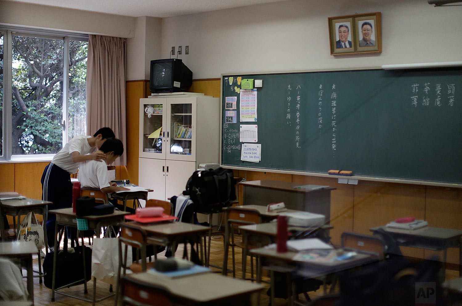  In this Sept. 26, 2017, photo, students study in a classroom at a senior high school in Tokyo.  (AP Photo/Eugene Hoshiko) 