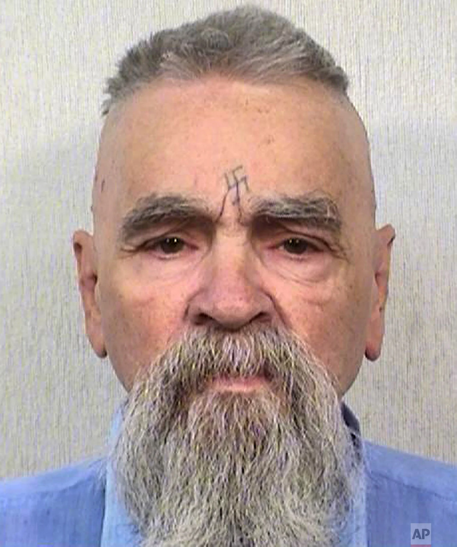 This Oct. 8, 2014 photo provided by the California Department of Corrections and Rehabilitation shows serial killer Charles Manson. (California Department of Corrections and Rehabilitation via AP)
