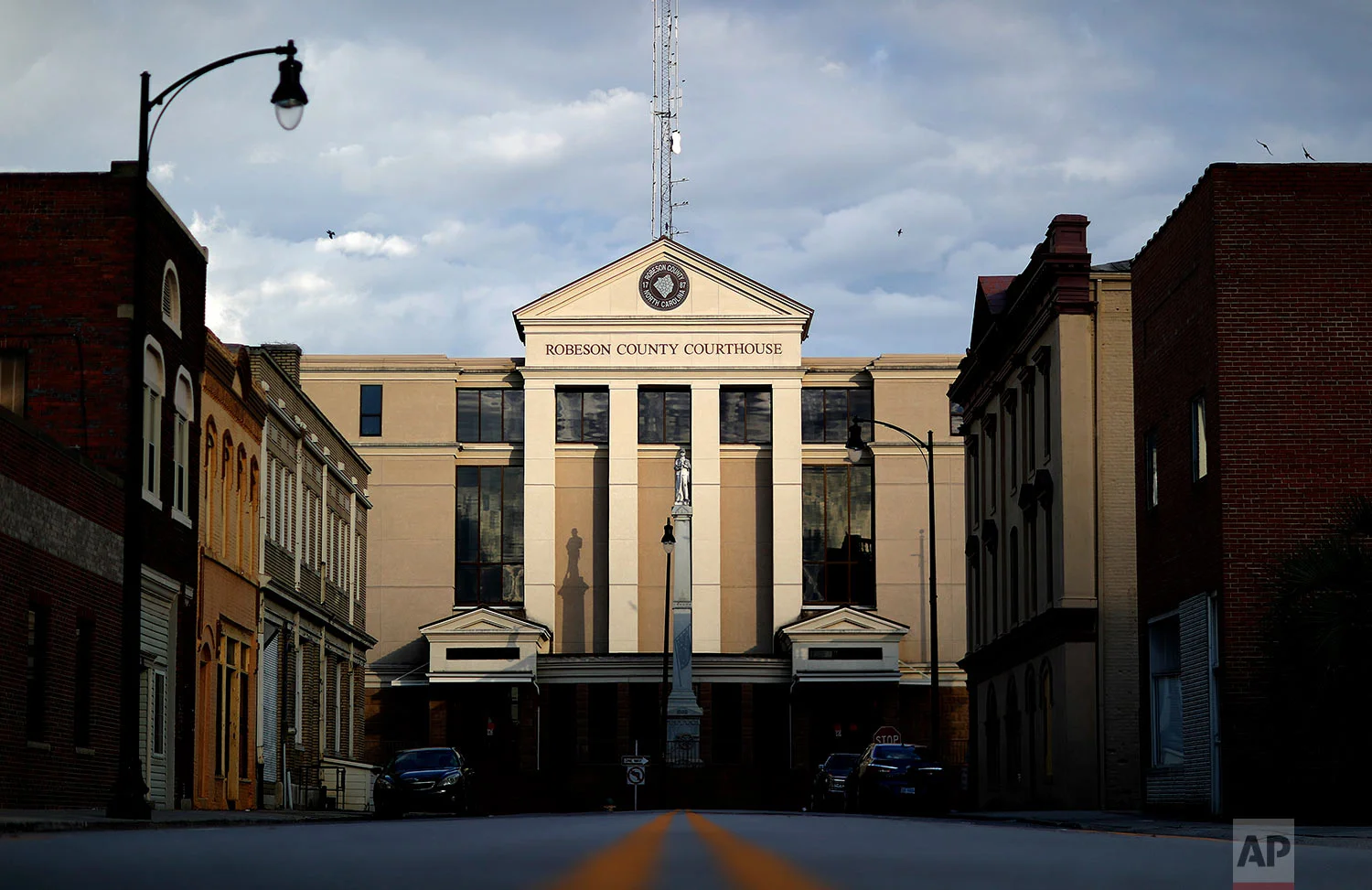A monument of a confederate soldier stands outside the Robeson County Courthouse in Lumberton, N.C. (AP Photo/David Goldman)