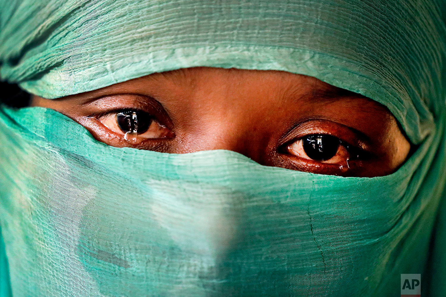  In this Wednesday, Nov. 22, 2017, photo, F, 22, who says she was raped by members of Myanmar's armed forces in June and again in September, is photographed in her tent in Kutupalong refugee camp in Bangladesh.&nbsp;(AP Photo/Wong Maye-E) 