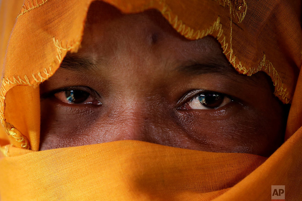  In this Wednesday, Nov. 22, 2017, photo, R, 28, mother of six, who says she was raped by members of Myanmar's armed forces in late August, is photographed in her tent in Kutupalong refugee camp in Bangladesh.  (AP Photo/Wong Maye-E)


 