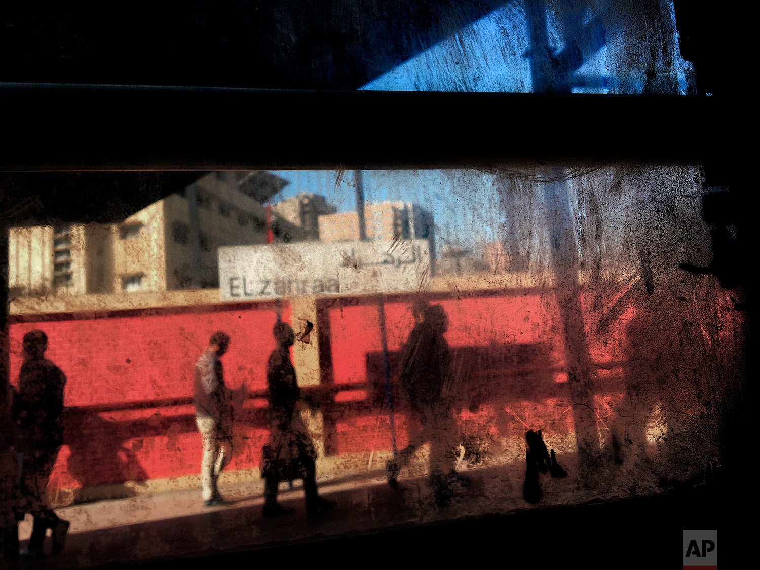 In this March 13, 2017 photo, people are seen from the window of a metro car, at El Zahraa metro station in Cairo, Egypt. Cairo’s subway is perhaps the cheapest in the world, 11 cents to ride as far as you want across the overcrowded, traffic-choked Egyptian capital -- but even that feels like a burden to many Egyptians at a time of tough economic reforms. (AP Photo/Nariman El-Mofty)