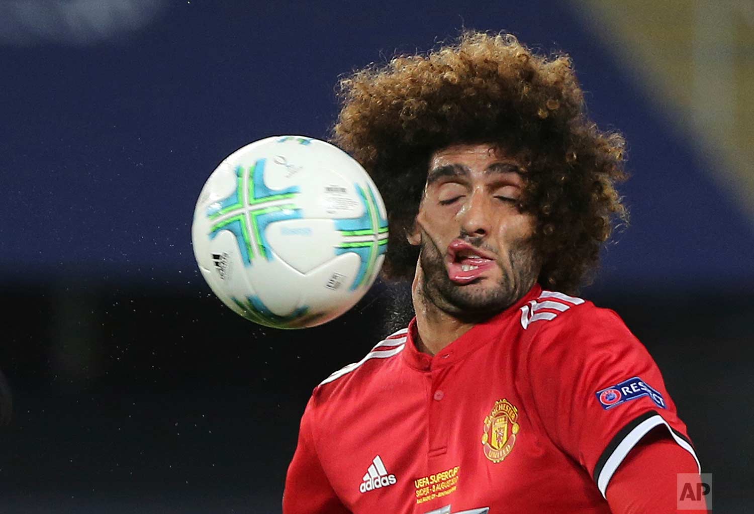  Manchester United's Marouane Fellaini heads the ball during the UEFA Super Cup final soccer match between Real Madrid and Manchester United at Philip II Arena in Skopje, on Aug. 8, 2017. (AP Photo/Boris Grdanoski) 