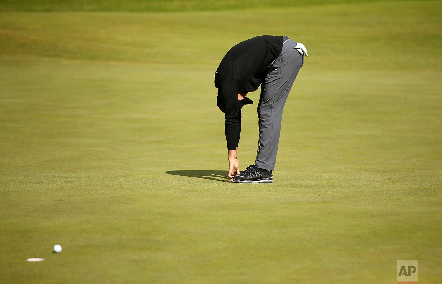  In this Saturday July 22, 2017 photo, Northern Ireland's Rory McIlroy reacts to a missed putt on the 4th green during the third round of the British Open Golf Championship, at Royal Birkdale, Southport, England. (AP Photo/Dave Thompson) 