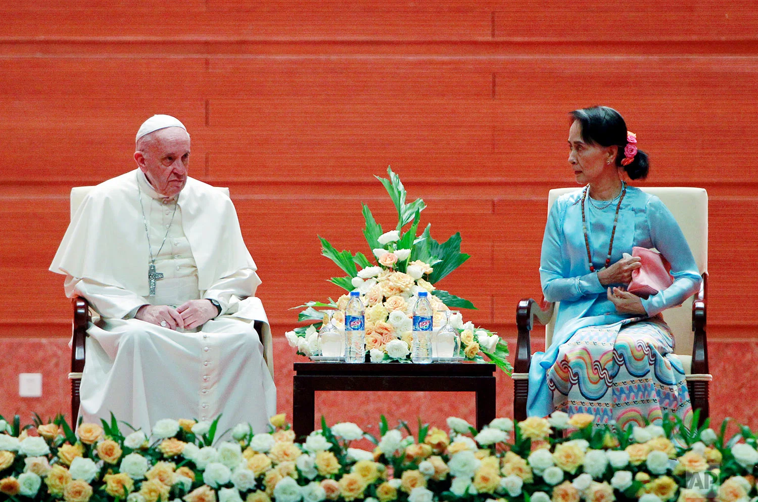 Myanmar's leader Aung San Suu Kyi talks to Pope Francis at a meeting in Naypyitaw, Myanmar, Tuesday, Nov. 28, 2017. (AP Photo/Aung Shine Oo)