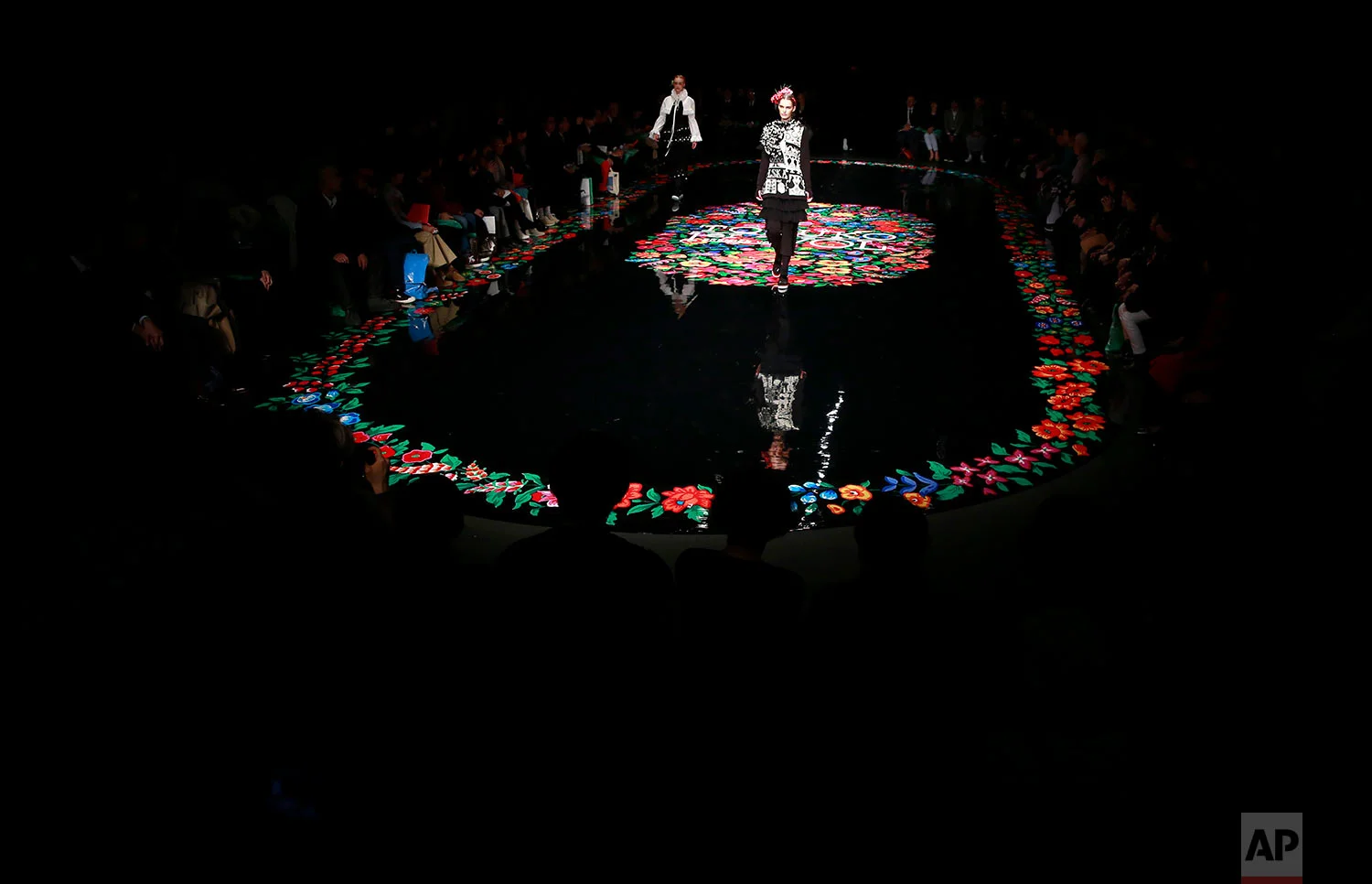 Models display creations by Tokuko Maeda during the 2017 Autumn/Winter Collection at the Tokyo Fashion Week in Tokyo, Thursday, March 23, 2017. (AP Photo/Shizuo Kambayashi)